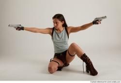 Shrima Kneeling Pose With Guns